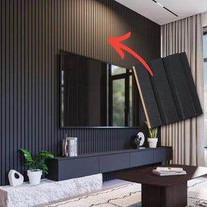 May include: A black wall panel featuring a series of vertical slats with a textured finish. The panel is shown as a sample piece with a red arrow pointing to its application on a large wall behind a television in a living room setting.