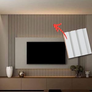 May include: A white rectangular wall panel featuring three vertical grooves, shown with a red arrow pointing to its application on a wall with vertical slat detailing behind a television and a low-profile media console cabinet.