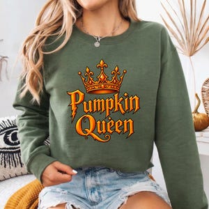 Adult t-shirt, toddler t-shirt, youth t-shirt, and adult or youth sweatshirt with personalized pumpkin family title graphic such as Queen, King, Princess, or Prince