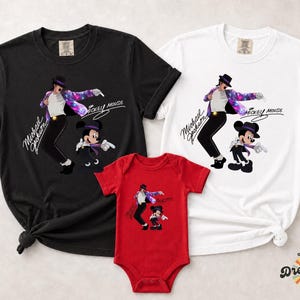 Unisex t-shirt, sweatshirt, hoodie, and baby bodysuit featuring a Michael Jackson and Mickey Mouse dancing graphic with galaxy jacket details and pop icon theme.