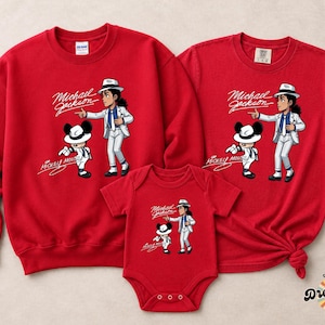 May include: Red family matching apparel set featuring a sweatshirt, t-shirt, and onesie. Each item displays a cartoon illustration of Michael Jackson and Mickey Mouse. The text "Michael Jackson" and "Mickey Mouse" are also visible.