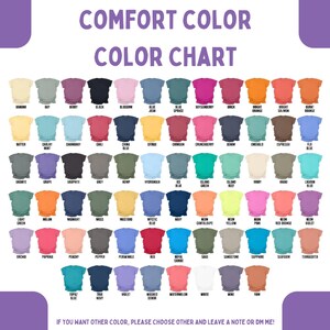 Pode incluir: Um gr&aacute;fico de cores com uma variedade de cores de camisetas, incluindo preto, azul, rosa e laranja. O texto "COMFORT COLOR COLOR CHART" est&aacute; no topo. O gr&aacute;fico inclui nomes de cores como "Berry", "Blossom" e "Emerald".