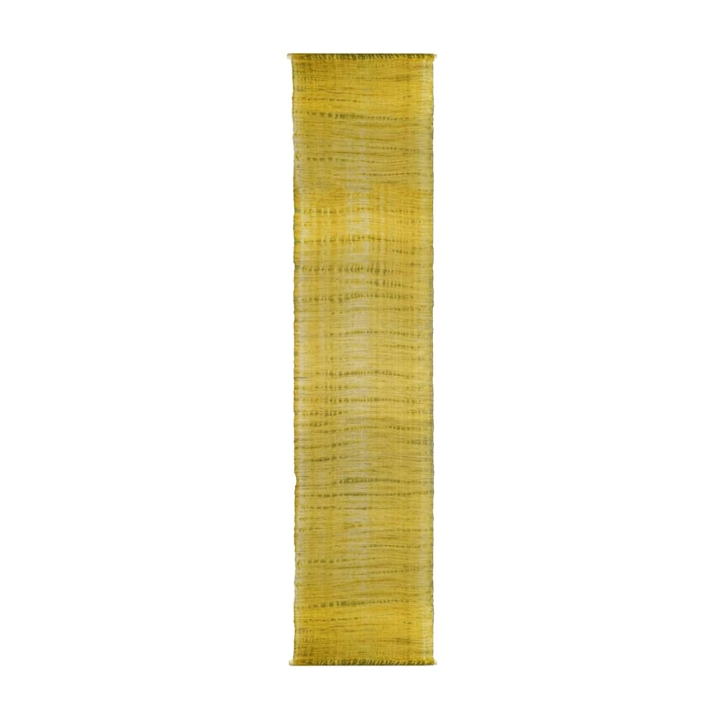 May include: A long, rectangular, yellow scarf with a textured, woven appearance. The scarf has a fringed edge and a subtle, horizontal striped pattern. The color is a warm, golden yellow, and the scarf appears to be made of a lightweight material.