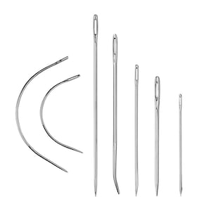 May include: A collection of six silver-toned metal sewing needles of varying shapes and sizes. Two needles are curved into a semi-circular arc, while the remaining four are straight, each featuring a distinct elongated eye at the top end.