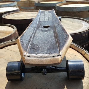 Whiskey barrel skate board