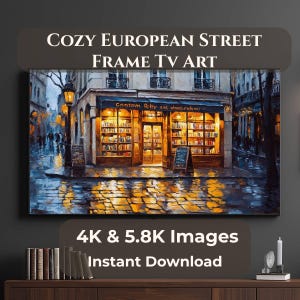 May include: A digital art print of a cozy European street scene, perfect for frame TV art. The image features a bookstore with warm interior lighting, cobblestone reflections, and the text "COZY EUROPEAN STREET FRAME TV ART". Includes "4K & 5.8K Images Instant Download".