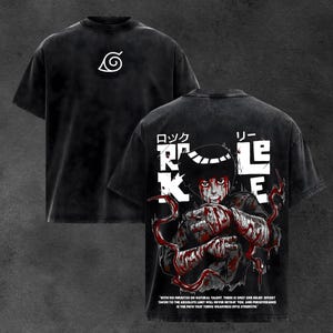 May include: Black t-shirt featuring a white spiral symbol on the front and a graphic of a character with Japanese text on the back. The character is depicted with red accents and text at the bottom.