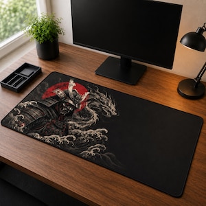 May include: A rectangular desk mat featuring a detailed illustration of a samurai in armor and a dragon emerging from stylized waves against a large red circular background. The design is set against a solid black background on the right side.