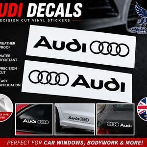May include: Two rectangular white vinyl decals featuring the black Audi logo and text. The image includes text labels for weather proof, water resistant, precision cut, and easy application, along with three small photos showing the decals applied to a car.