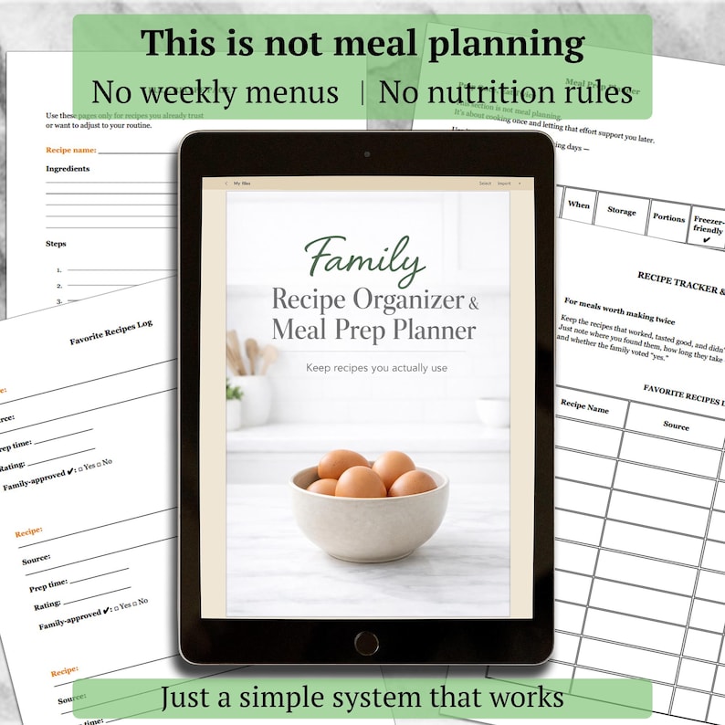 May include: A digital tablet showing a "Family Recipe Organizer & Meal Prep Planner." The screen displays a bowl of eggs. Recipe pages with fill-in sections surround the tablet. Text at the top reads "This is not meal planning." The text "Just a simple system that works" is at the bottom.