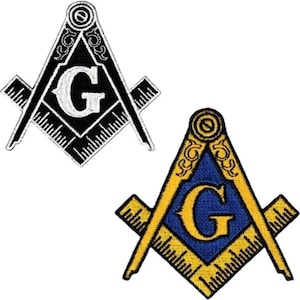 May include: Two embroidered patches featuring the Masonic Square and Compasses symbol. One patch is black and white, the other has a blue center with gold-colored details. Both include the letter "G".