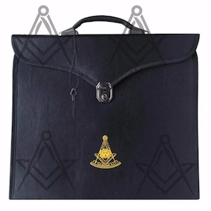 May include: Black briefcase with a handle and a silver clasp. The briefcase features a gold emblem and a key attached to the clasp. Masonic symbols are subtly printed on the front and sides.
