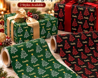 May include: Two rolls of wrapping paper, one green and one black, featuring a repeating pattern of white and red Christmas trees with the name Emily printed repeatedly. Two gift boxes are wrapped in the same paper with ribbons.