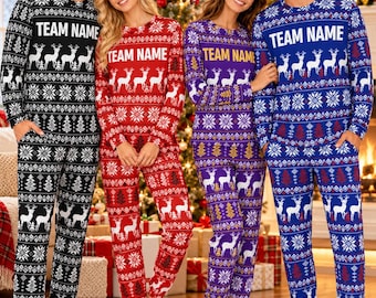 May include: Four matching long-sleeve pajama sets in black, red, purple, and blue. Each set features a repeating white pattern of reindeer, snowflakes, and trees, with the text TEAM NAME printed in white or yellow across the chest.