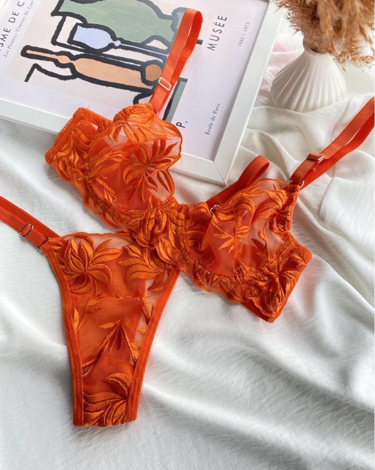 orange lingerie sexy Dolly Parton Has A Secret Collection of Tattoos For This Very Important  Reason – Celeb Secrets main image 0