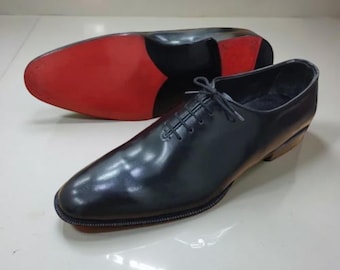 Christian Louboutin Oxford-Schuhe aus schwarzem Kalbsleder, roter Unterteil, rote Sohle