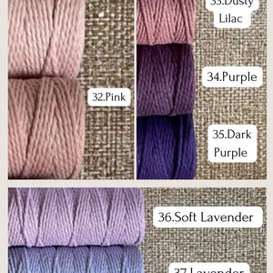 May include: Close-up of several bundles of colorful macrame cord in shades of pink, purple, and lavender. Each bundle is labeled with a color name, including Pale Pink, Pink, Dusty Lilac, Purple, Dark Purple, Soft Lavender, and Lavender.