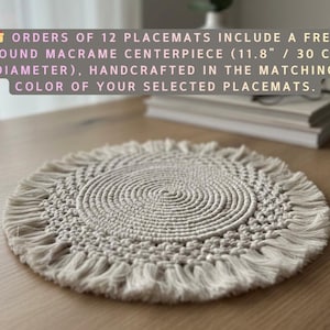 May include: A round macrame centerpiece, approximately 11.8 inches in diameter, with a fringed edge. The centerpiece is a neutral beige color and is handcrafted. The text on the image says that it is included with orders of 12 placemats.