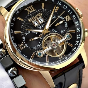 メンズ自動巻きスケルトンウォッチ、ゴールドケース、レザーストラップ、多機能カレンダー