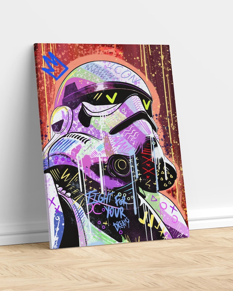 May include: A canvas print featuring a stylized Stormtrooper helmet with graffiti art. The helmet is rendered in vibrant colors including purple, pink, and green, with the words "Fight for your dreams". A blue crown is in the upper left corner.