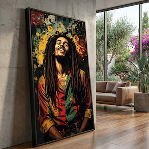 Puede incluir: Una impresión artística enmarcada que presenta un retrato de una persona sonriente con rastas. La persona lleva una camisa colorida con tonos rojos, amarillos y verdes. El fondo tiene salpicaduras de color abstractas.