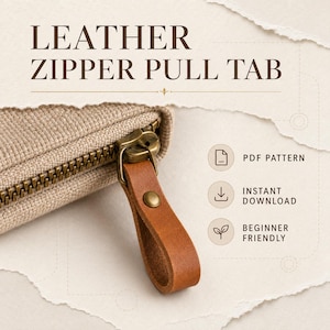 May include: A tan fabric zipper with a brown leather pull tab attached by a brass metal fastener. The text LEATHER ZIPPER PULL TAB is at the top, with icons and text for PDF PATTERN, INSTANT DOWNLOAD, and BEGINNER FRIENDLY on the right side.