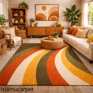 May include: A vibrant area rug with a retro design. The rug has curved stripes in green, orange, yellow, and cream. The rug is in a living room with a sofa, wooden furniture, and plants. The text "Islamucarpet" is visible at the bottom.