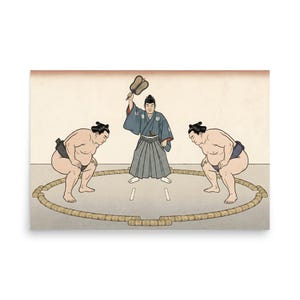 May include: A print showing a sumo wrestling contest. Two wrestlers in loincloths are positioned in a ring, with a referee holding a fan. The artwork features a neutral background and traditional Japanese clothing.