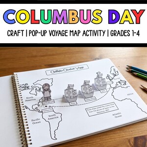 May include: A spiral-bound activity book featuring a black and white map of the world with pop-up paper cutouts of three ships labeled Pinta, Santa Maria, and Nina, and a figure labeled Taino people, with text reading Christopher Columbus Voyage.
