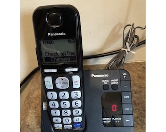 Contestador automático Panasonic KX-TGE230 con dos auriculares. Funciona correctamente y con potencia comprobada.