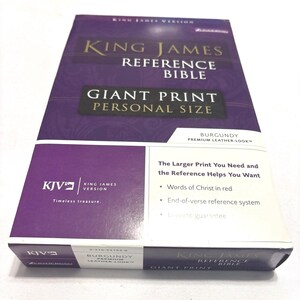 May include: A burgundy King James Version Reference Bible with giant print and a personal size. The cover features the text "King James Reference Bible" and "Giant Print Personal Size". The book includes "Words of Christ in red".
