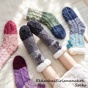 May include: Cozy cable-knit socks in various colors, including pink, purple, green, and blue, with a soft, white, faux-fur lining. Some socks have pom-pom accents. The text "EkkachaiSiriananchok Socks" is visible.
