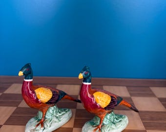 Set of two ceramic pheasant figures made by Beswick 767b.