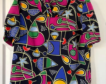 Vintage 80s black multi coloured short sleeve blouse in modernist abstract print design size medium 12-14