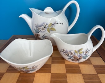Vintage Midwinter pottery tea set in the 'Sakura' (also known as 'British Orchid Blossom' or 'Arcadia') pattern, produced on the Stylecraft