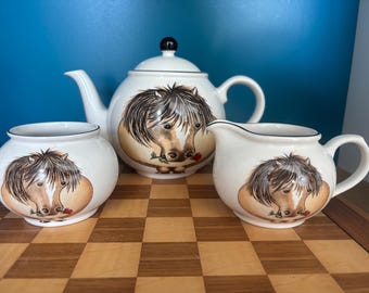 Arthur Wood "Pony and Rose" ceramic teapot set, "Back to Front" novelty series . Teapot, milk jug/ creamer and sugar bowl