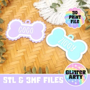 May include: Two bone-shaped pet tags with scalloped edges. One tag is light purple with the white text COCO, and the other is light blue with the white text ZIGGY. A circular badge displays the text 3D PRINT FILE, and another displays GLITTER ARTY.