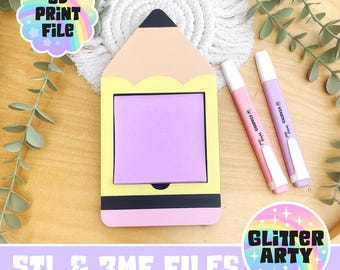 May include: A pencil-shaped notepad holder with a light yellow and peach design, holding a square of purple sticky notes. Two pink and purple highlighters and a rainbow sticker are also visible. The text "3D PRINT FILE" is on the sticker.