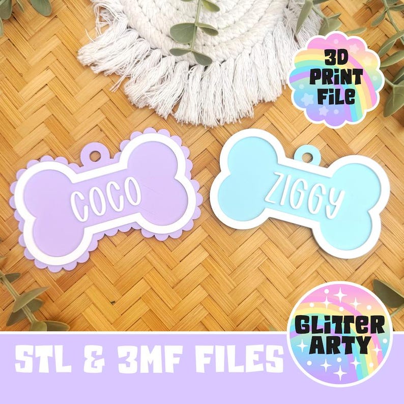 May include: Two bone-shaped pet tags with scalloped edges. One tag is light purple with the name COCO in white, and the other is light blue with the name ZIGGY in white. Each tag has a small hole for attachment. Includes text 3D PRINT FILE and GLITTER ARTY.