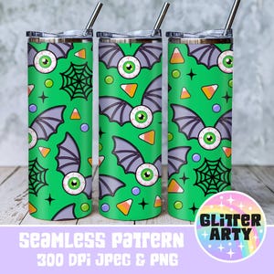 May include: Three green Halloween-themed tumblers with silver lids and straws. The tumblers feature a repeating pattern of bat wings, eyeballs, candy corn, and spiderwebs. The bottom of the image has the text "SEAMLESS PATTERN 300 DPI JPEG & PNG".