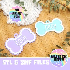 May include: Two bone-shaped pet tags with white borders and raised white lettering. One tag is light purple with the name COCO, and the other is light blue with the name ZIGGY. Each tag features a small circular hole at the top for attachment.