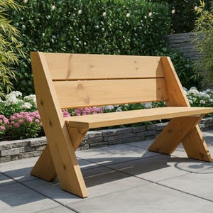 May include: A wooden outdoor bench with a natural finish. The bench has an X-shaped leg design and a slatted backrest. The bench is surrounded by greenery and flowers, creating a relaxing outdoor seating area. The bench is approximately 60 inches long.