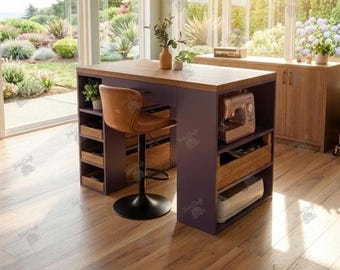 May include: A dark purple craft table with a wooden top, featuring open shelving units on both sides containing wooden drawers, a sewing machine, and a cutting machine. A brown leather swivel stool with a black metal base is tucked underneath.