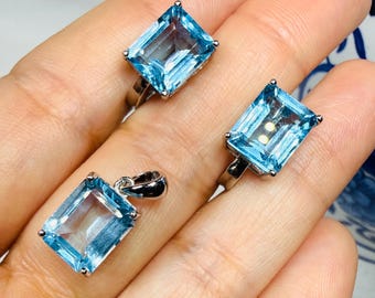 Authentic Genuine natural Swiss Blue Topaz set in 925 sterling silver, earrings & pendant set. Stone size 11 x 9 mm