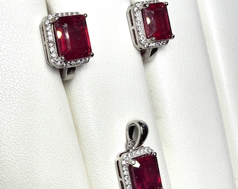 Authentic Genuine natural rubies set in 925 sterling silver, earrings & pendant set. Stone size 9 x 7mm