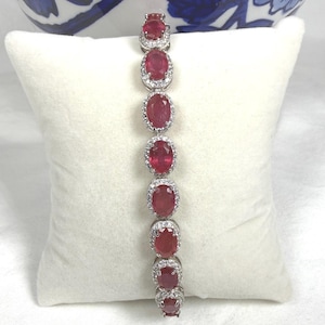 Certified genuine natural Ruby gemstones and CZs set in 925 sterling silver.
