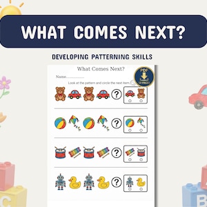May include: Educational worksheet titled "What Comes Next?" with developing patterning skills. The worksheet features rows of colorful illustrations of toys and shapes, including teddy bears, cars, balls, kites, drums, and robots. A red toy car and building blocks are also visible.