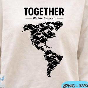 May include: Cream-colored sweatshirt with the words "TOGETHER - We Are America" in black. A black graphic of the Americas is formed by interlocking hands. The design includes the text "2PNG + SVG" and "Transparent background - 300 DPI -high quality".