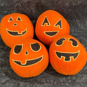 Embroidered Pumpkin Face Fleece Ball: Sensory Toy