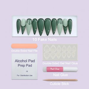 May include: A set of 10 fake nails in a box, featuring a dark green and light green color scheme with a drip design. The set includes a double-sided nail file, alcohol prep pad, double-sided gel nail glue, nail glue, and a cuticle stick.